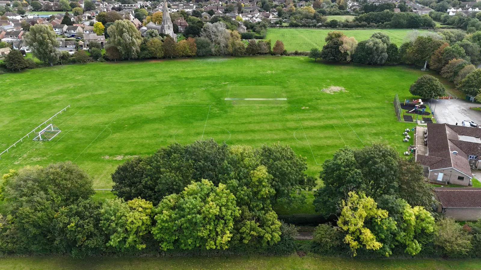 Aerial view of the recreation field and Alconbury village