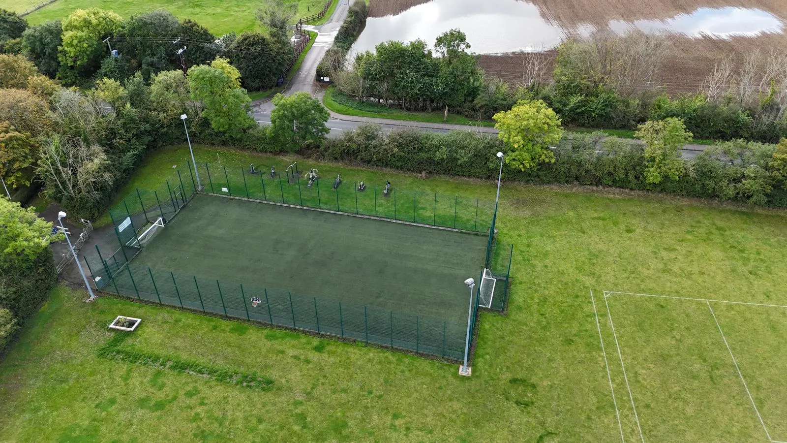 Aerial view of the floodlit MUGA