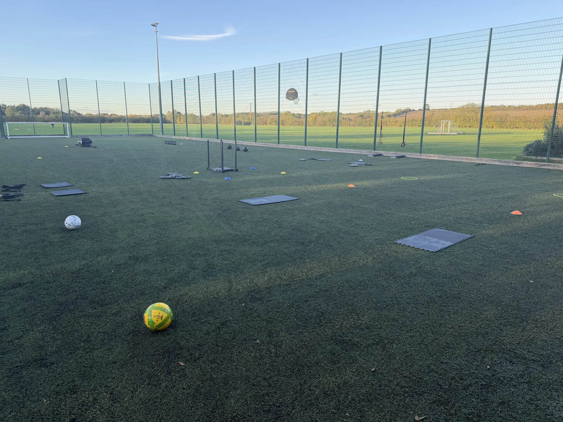 Boot camp equipment laid out on the 3G surface