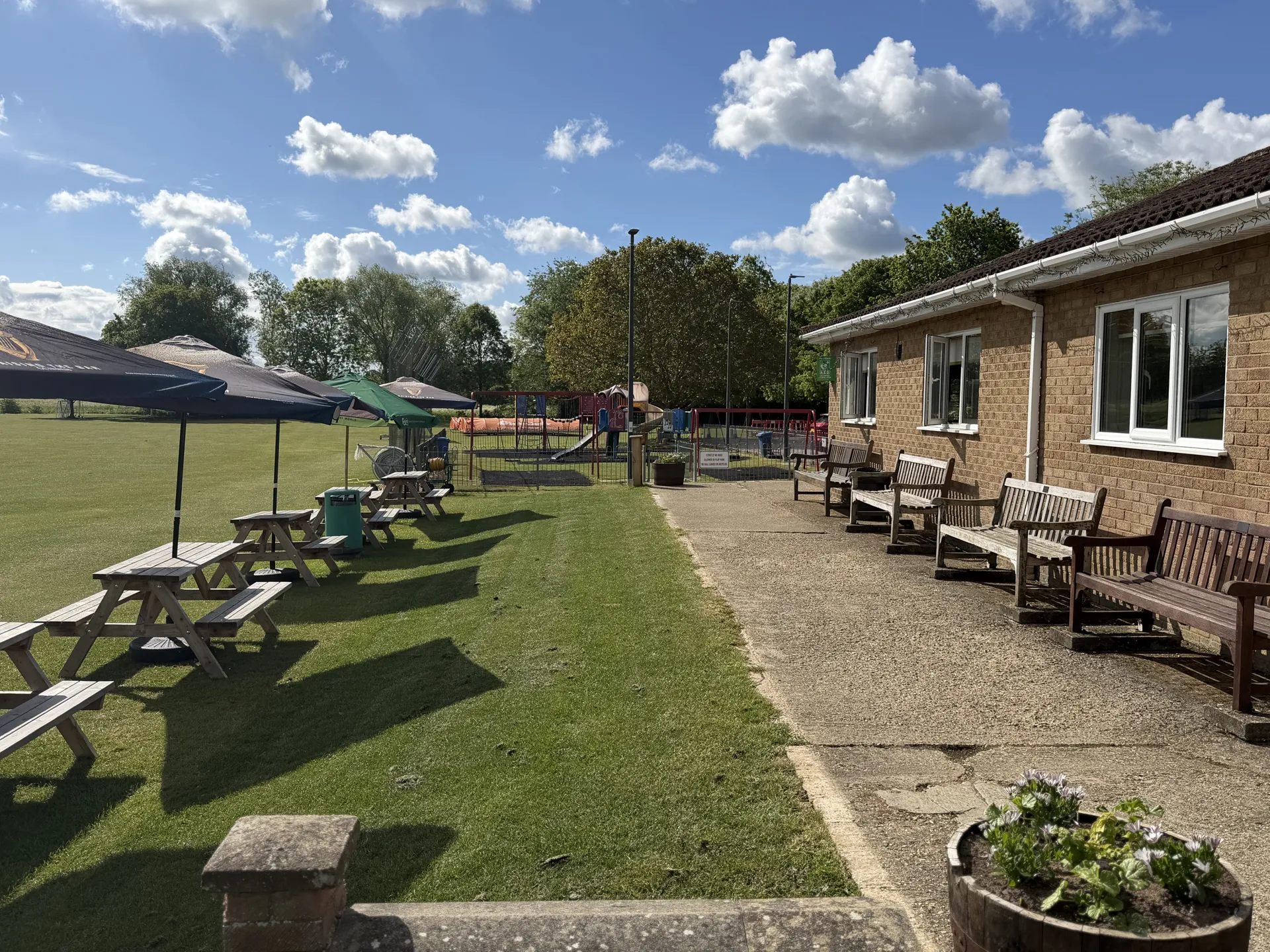 The patio and benches outside the clubhouse